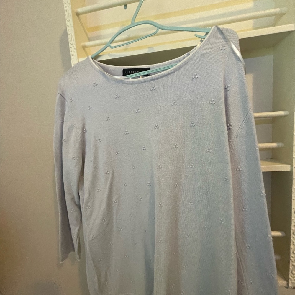 light blue sweater